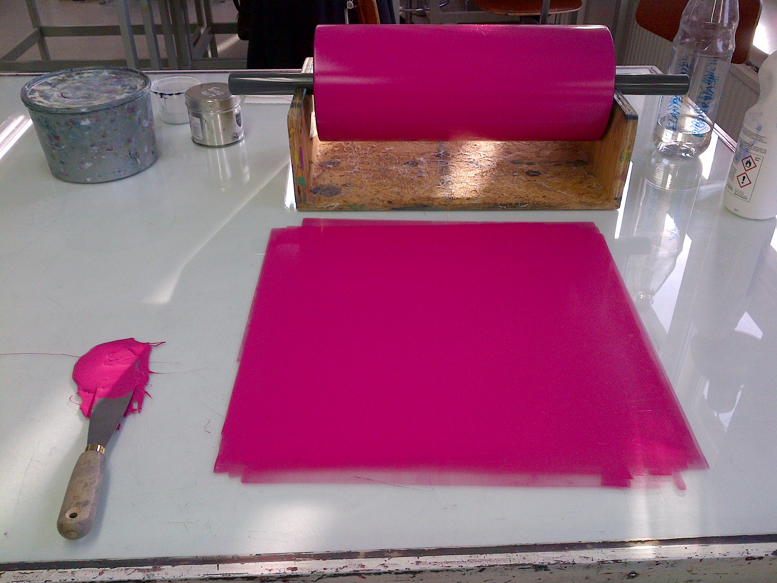 mixing and rolling out the magenta ink for the last layer